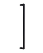 Tirador simple negro mate. Fijación invisible. Largo 60 cm.